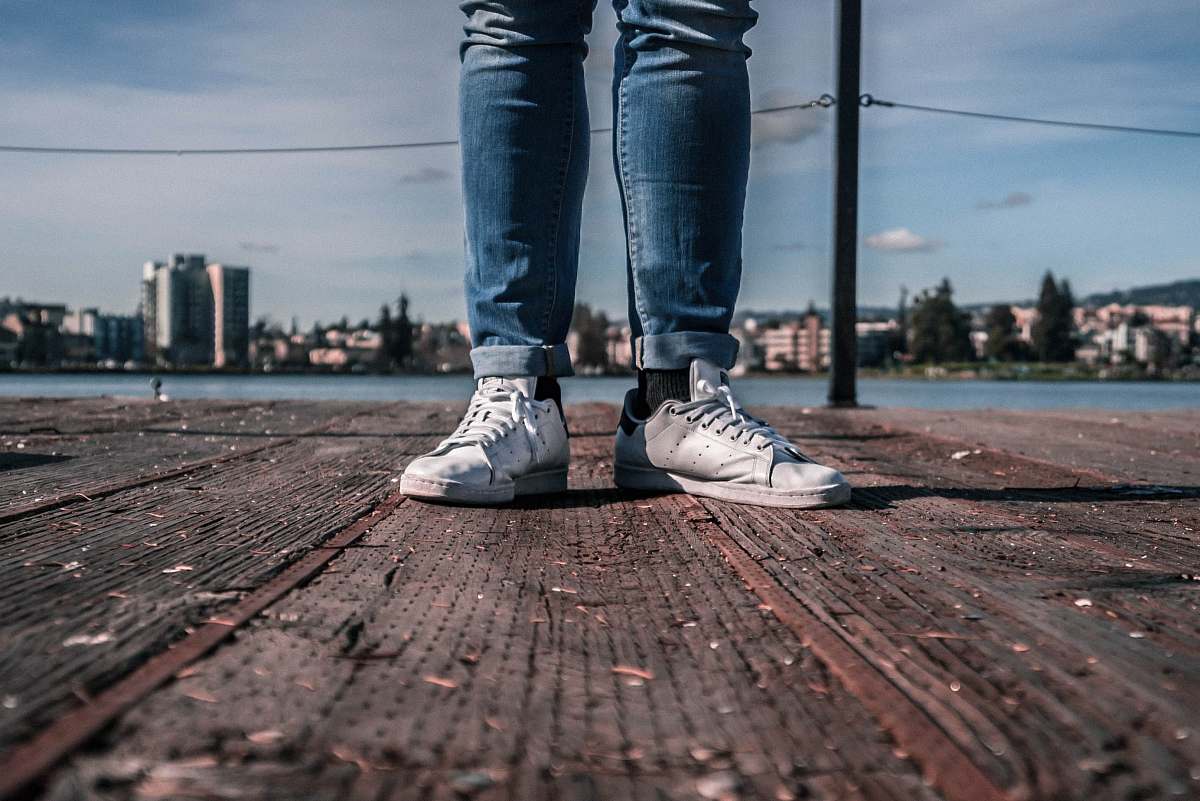 shoe person wearing white low-top shoes oakland